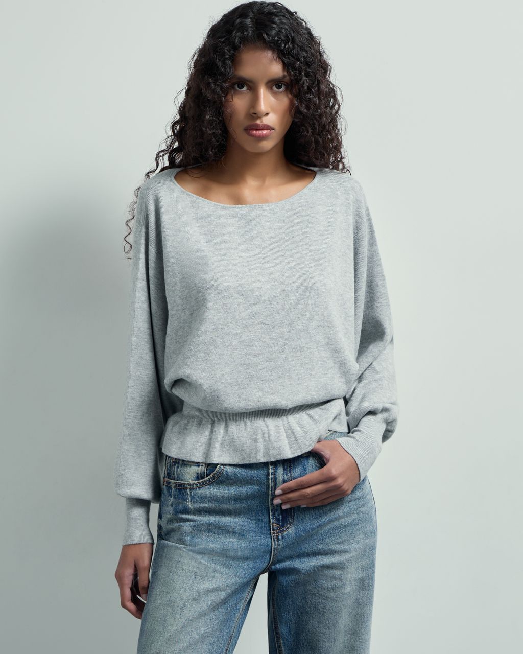 BATSLEEVE PEPLUM SWEATER
