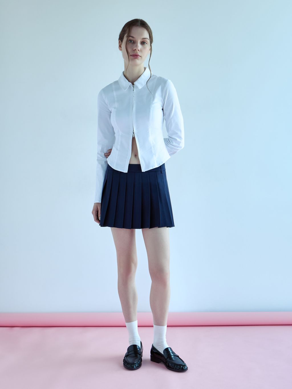LOW WAIST PLEATED MINI SKIRT