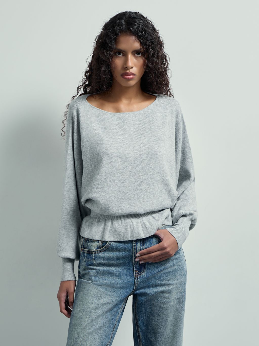 BATSLEEVE PEPLUM SWEATER