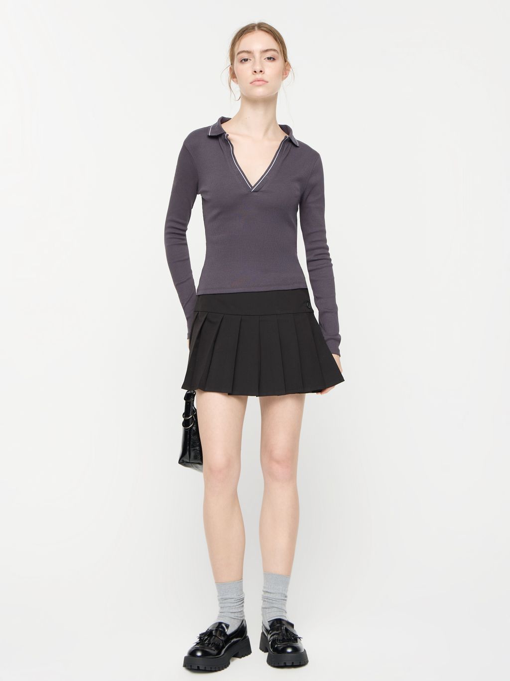 PLEATED SKORT WITH DECORATIVE BUTTONS